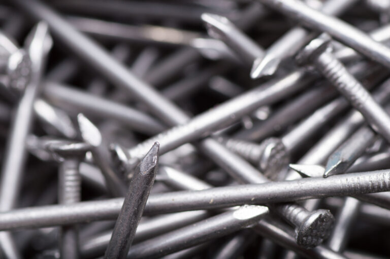 macro background of metal construction nails close up